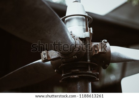 Close up view of rusty old steel helicopter rotor blades. Royalty-Free Stock Photo #1188613261