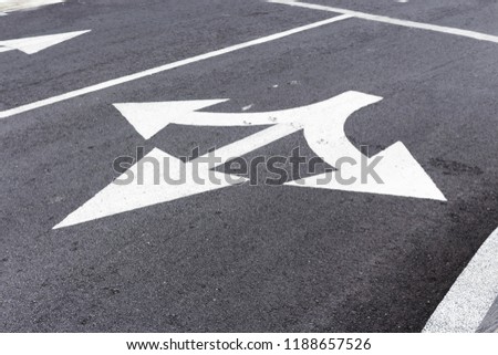 Straight or Turn Left or Right Road Sign on Asphalt.
