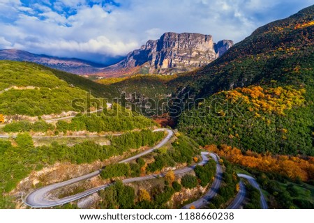 Aerial view of the the Vikos Gorge in the autumn and provincial road with many zigzag in the Epirus Zagorohoria, Greece. National park Royalty-Free Stock Photo #1188660238