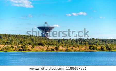 Landscape withe river and satellite communication antenna