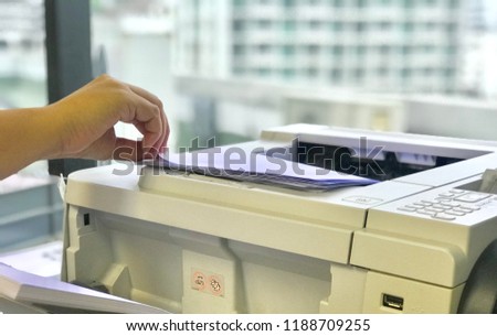 Business women Hand open on printer,printer scanner laser office copy machine
