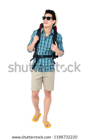 Portrait of handsome young Asian man tourist backpacker isolated on white background studio shot, beach traveling concept