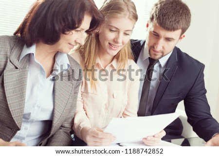 Male Doctor Giving The Prescription Paper To