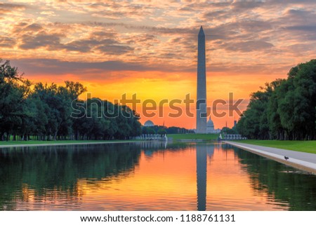 Washington Monument at Sunrise from new reflecting pool in Washington DC, USA.