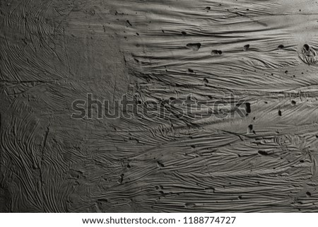 Vintage or aged grungy background empty space of natural concrete cement, plaster or stone, old texture as a retro pattern wall. Abstract blank wide raw & bare wall for design ideas, text, pictures.