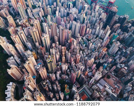 Aerial view of Hong Kong Downtown. Financial district and business centers in smart city in Asia. Top view of skyscraper and high-rise buildings.