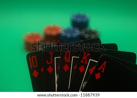 A great hand in a poker game with a green background.