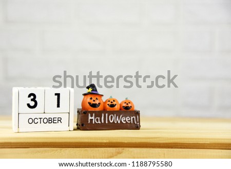 October 31 Halloween pumpkin on the wood table Copy space