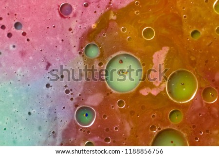 A water oil, color, acrylic color, paint, dye, orange, red, yellow, green, blue color milk drops macro, water drops bubbles, abstract design, abstract colors, color abstract, reflection drops