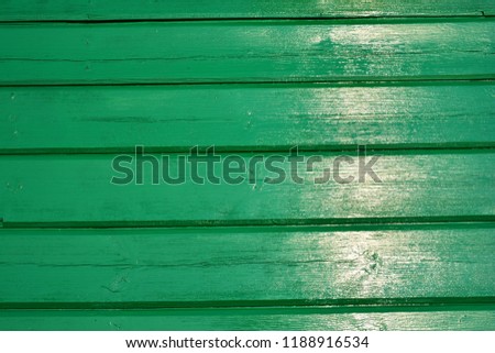 Beautiful freshly painted wooden green background, painted boards, green tree, background for presentation, printing, website, banner, poster, calendar, background for picture, business card, notebook