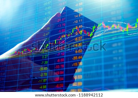 Investment growth concept with price of gold on gold market graph background: Candle stick graph chart for investment trading to grow in the active high trend and low trend.