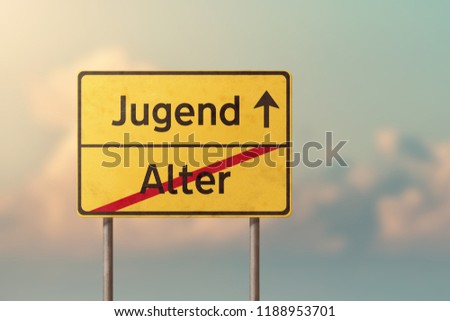 youth and old age - yellow traffic sign with inscriptions in German