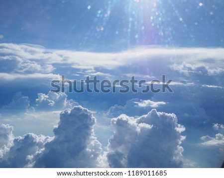 Over the clouds with top view. Beautiful perfect blue sky and fantastic natural cloudy cover the earth on the atmosphere with sunlight for background.