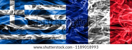 Greece vs France smoke flags placed side by side. Thick colored silky smoke flags of Greek and France