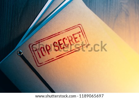 Private investigator desk with top secret envelopes Royalty-Free Stock Photo #1189065697