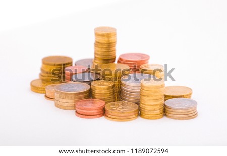 Money US dollars and Euros on a white background, different monetary coins