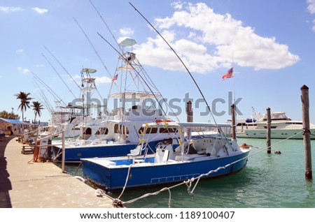 Chartered fishing boats at a marina in Southeast Florida Royalty-Free Stock Photo #1189100407