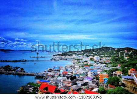 The city on the island surrounded by sea, sky and mountains are prospered.blur