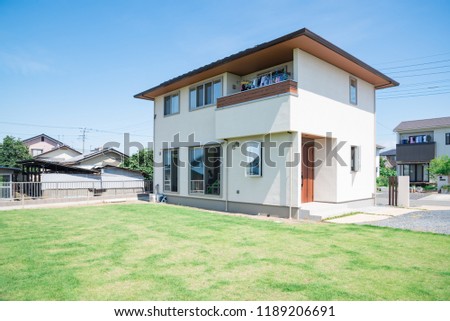 Large house in the garden Royalty-Free Stock Photo #1189206691
