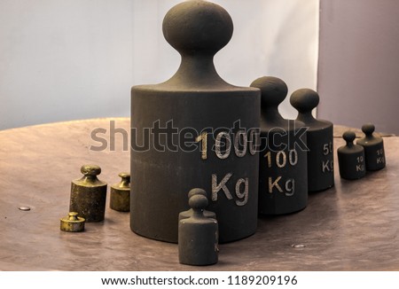 Old iron weight measurement units Royalty-Free Stock Photo #1189209196