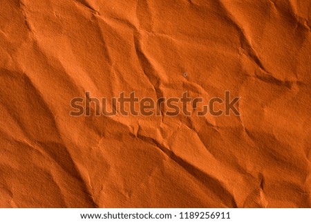 Orange crinkle paper background.