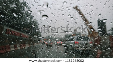 Blur view of rain drop on window. Selective focus. 