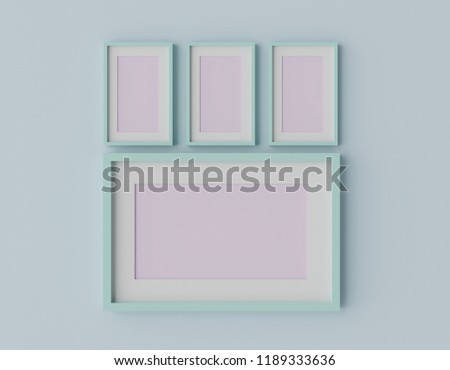 Blank mint green color picture frame template for place image or text inside on the light blue wall. pastel concept.