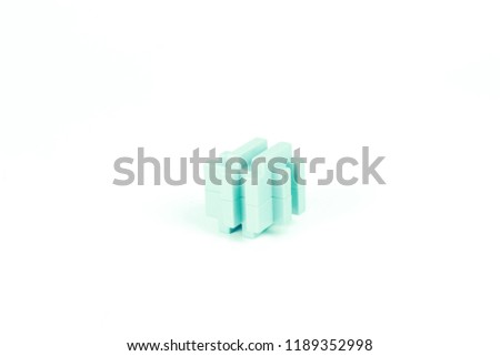 Child toy building block isolated on a white background.