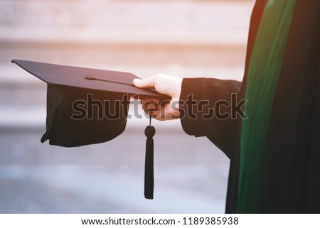 graduation,Student hold hats in hand during commencement success graduates of the university,Concept education congratulation.Graduation Ceremony,Congratulate the graduates in University. 