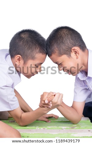 Two boys are playing Arm wrestle isolated on white background.