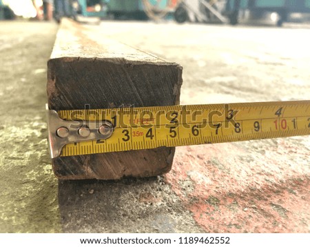 the square steel and measuring tape ,at factory,prepare for work