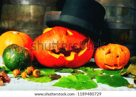 Halloween-pumpkin head on a wooden table . Happy Halloween.