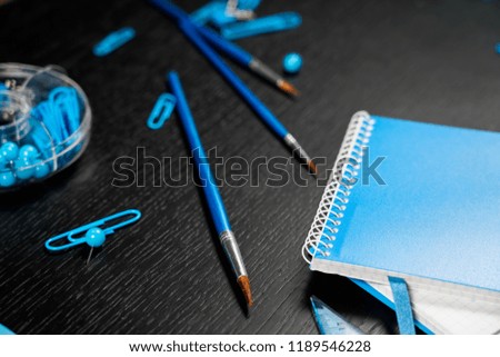 Back to school of education season background or business office desk concept. Flat lay essential objects for learning or working on wooden plank.