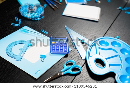 Back to school of education season background or business office desk concept. Flat lay essential objects for learning or working on wooden plank.