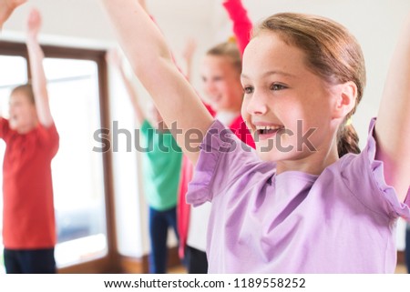 Group Of Children Enjoying Drama Class Together Royalty-Free Stock Photo #1189558252