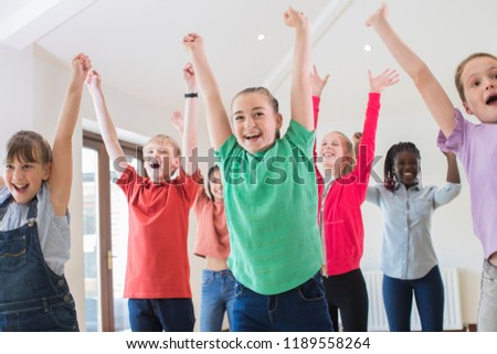 Group Of Children Enjoying Drama Class Together Royalty-Free Stock Photo #1189558264