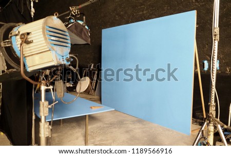 Blue screen backdrop and big LED studio light for movie video or film photography production and other equipment such as tripod, black screen backdrop, prop and any professional tools. 