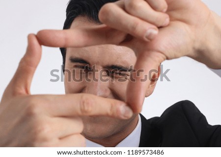 Businessman making framing hand, the concept of a modern perspective.