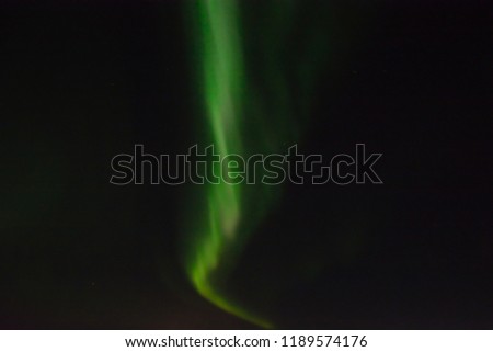 Polar lights in the night sky. Multicolored auroras of various shapes. Night shooting.