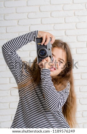 girl with photocamera