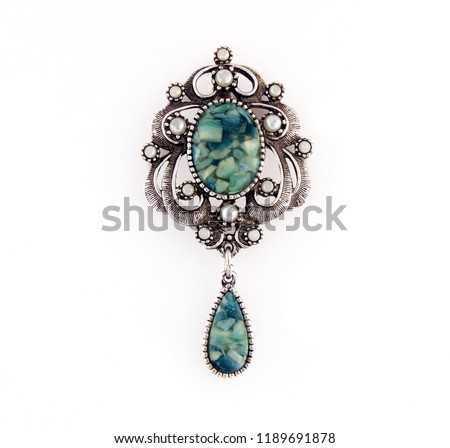 vintage brooch, isolated Royalty-Free Stock Photo #1189691878