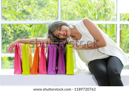lady wiht the colorful shopping bag, Business concept of commercial photo.