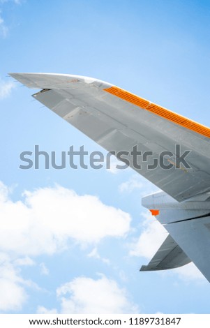 Photograph of the tail element of a large commercial aircraft