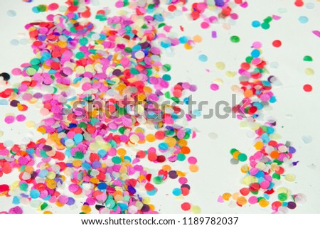 Colorful bright horizontal confetti background in studio. 