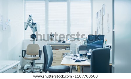 Bright and Modern Medical Doctor's Office, Complete with Personal Computer and ENT, Ophthalmology Equipment. Royalty-Free Stock Photo #1189788508