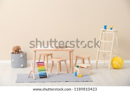 Stylish child's room interior with toys and new furniture Royalty-Free Stock Photo #1189810423