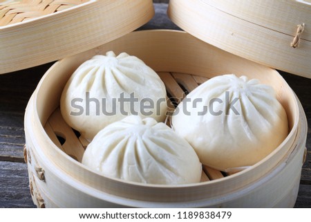 Dumplings in a Bamboo Steamer