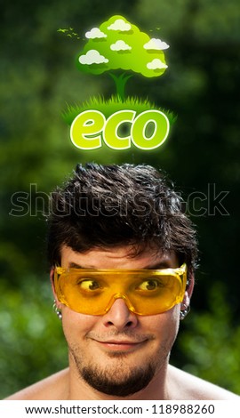 Young persons head looking at green eco sign