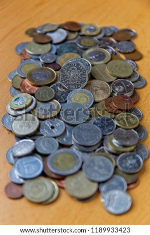 Mixture of old coins and legal tender of several countries