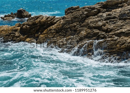 Rock and sea waves